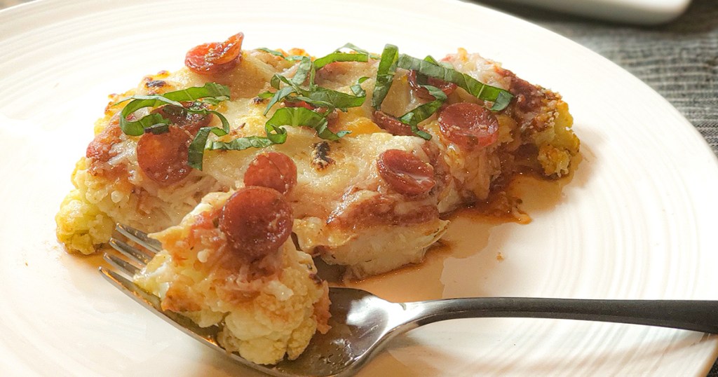 fork with bite of keto cauliflower parm