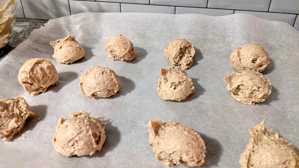 keto snickerdoodle fat bombs on parchment-lined pan