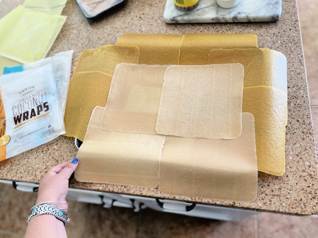 placing wraps on a sheet pan for keto quesadilla