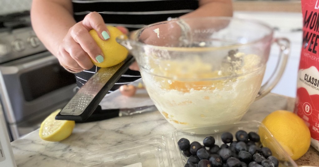 zesting a lemon for keto pound cake 