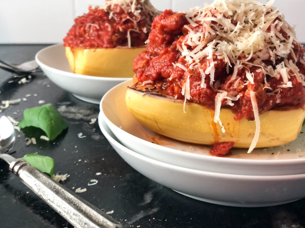 keto marinara sauce on spaghetti squash topped with parmesan