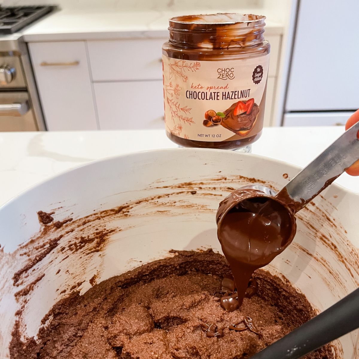 Chocolate Hazelnut spread going in cake batter