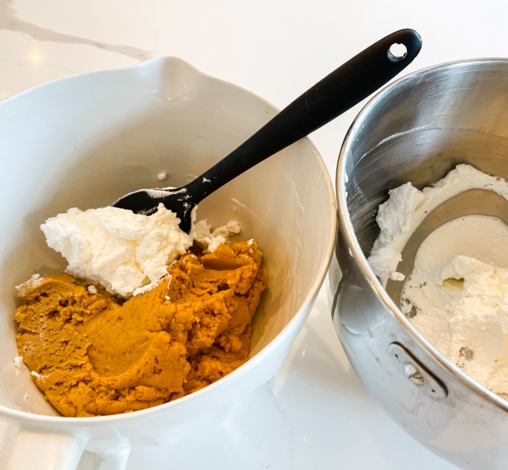 bowl with peanut butter mixture and bowl with whipped cream 