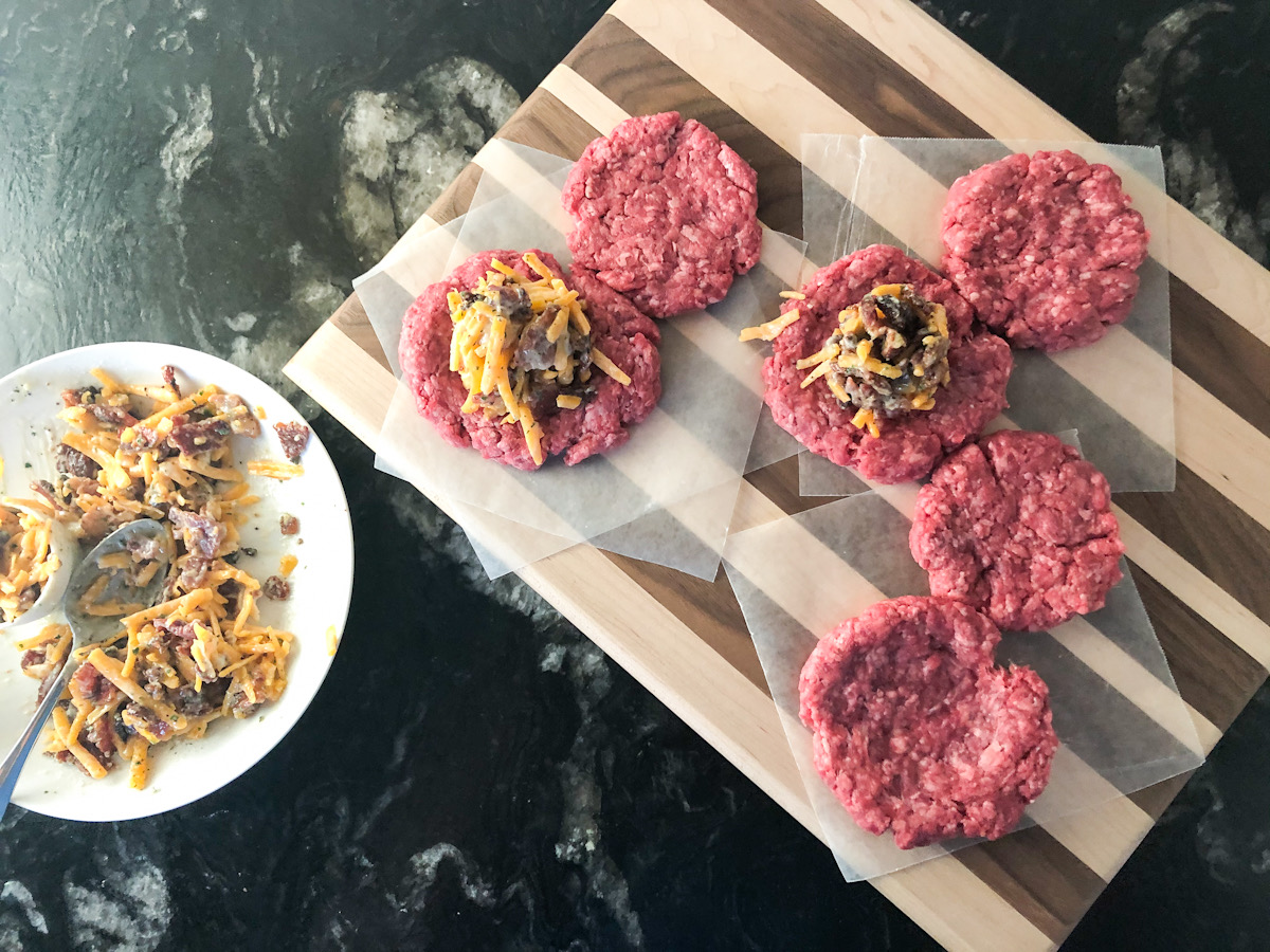 raw hamburger patties with filling