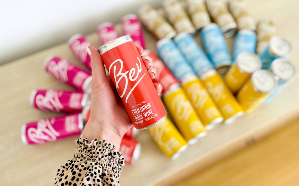 hand holding a can of bev canned wine