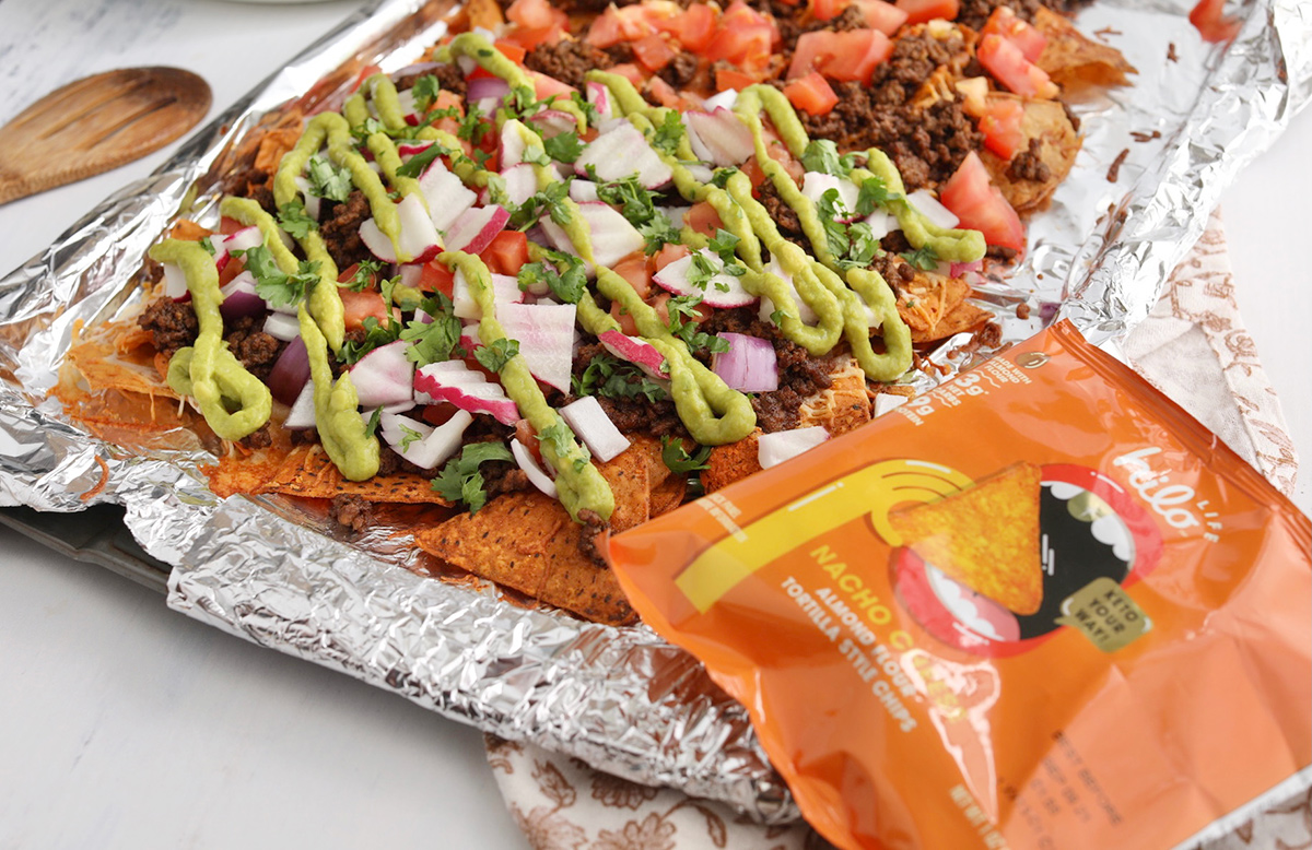 pan of sheet pan nachos with hilo life chips