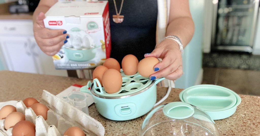 placing eggs in a dash express egg cooker