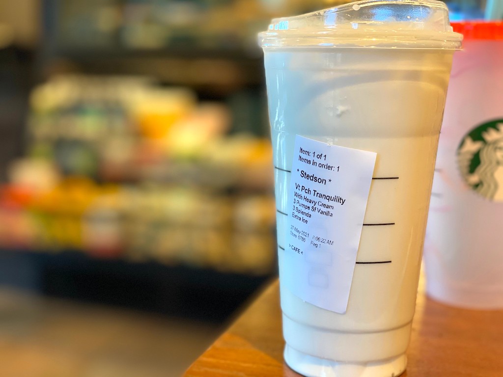 Starbucks peach drink order listed on cup 