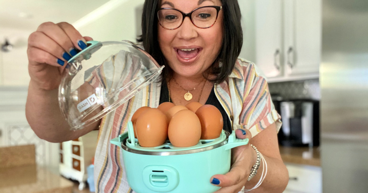 woman cooking eggs in Dash egg cooker