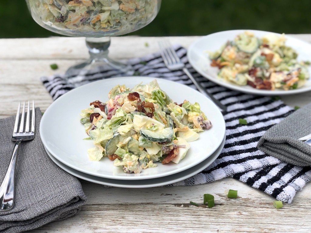 24 hour salad on plates with forks