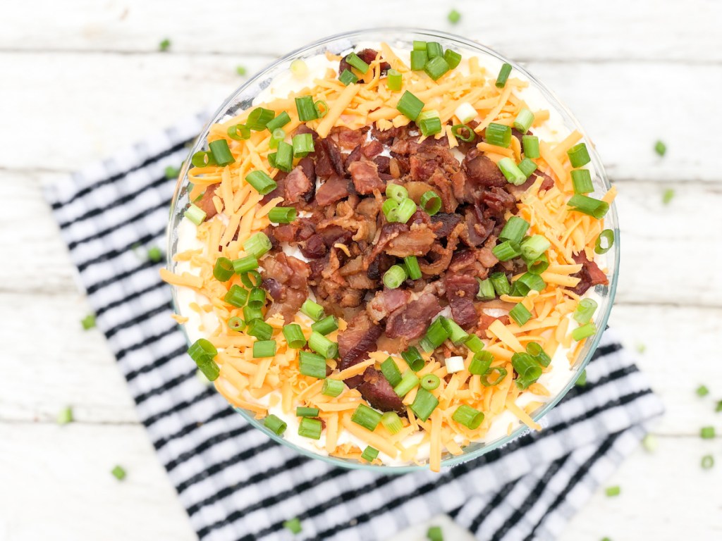 keto 24 hour salad with bacon, cheese, green onions on top