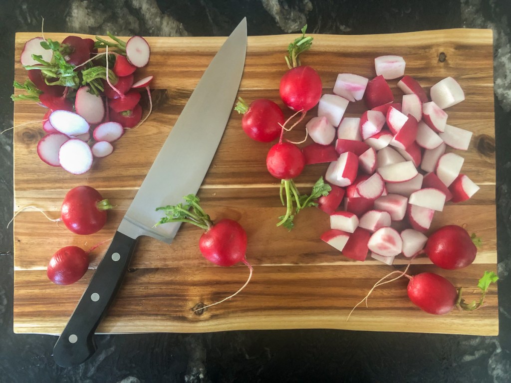 radishes on a cutting board