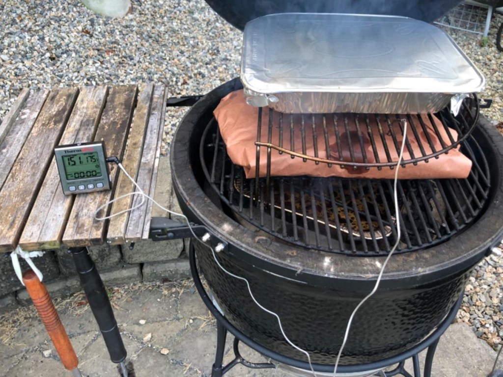 meat thermometer next to smoker