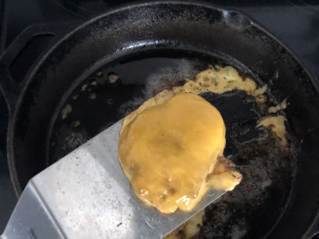 melted cheese on a burger