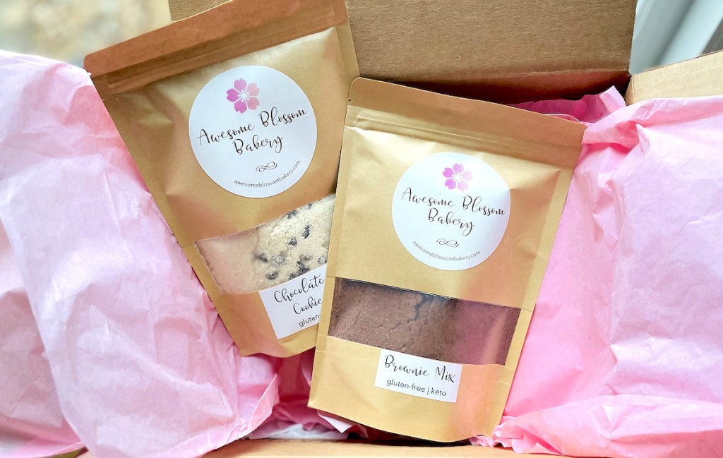 two awesome blossom baking mixes in box with pink tissue paper