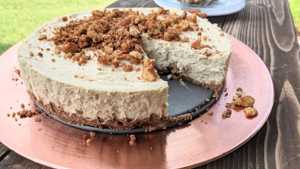 keto churros cheesecake with one slice removed 