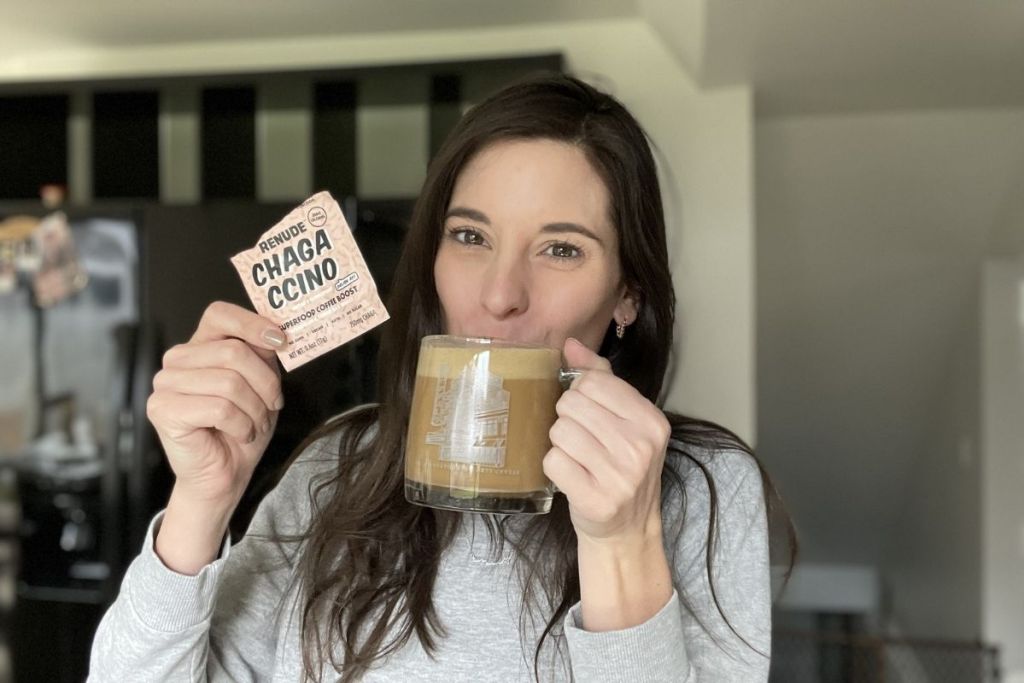 woman drinking Renude mushroom coffee