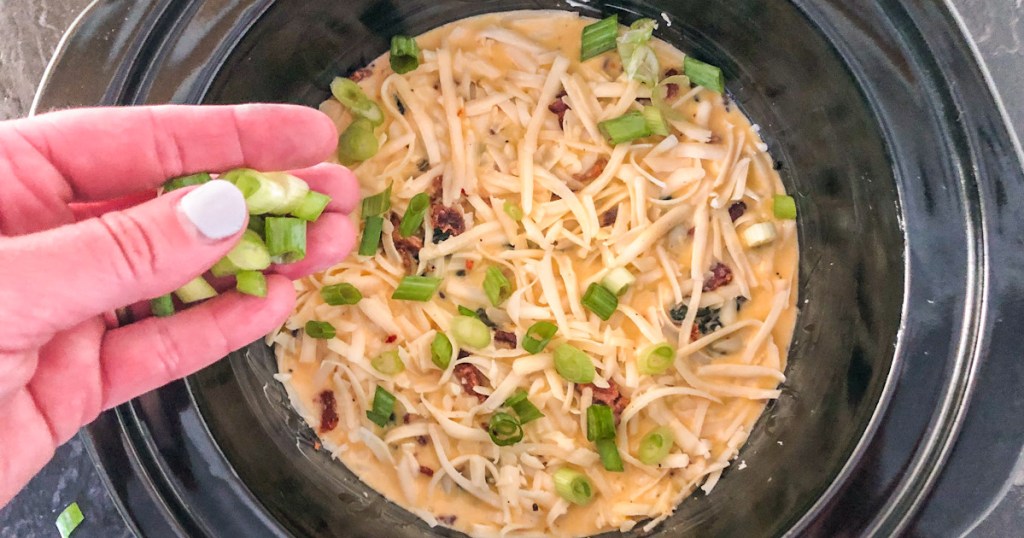 adding green onions to keto crockpot breakfast casserole