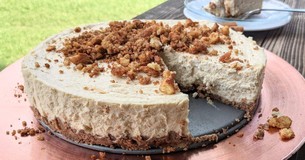 keto churro cheesecake in pan with slice taken out