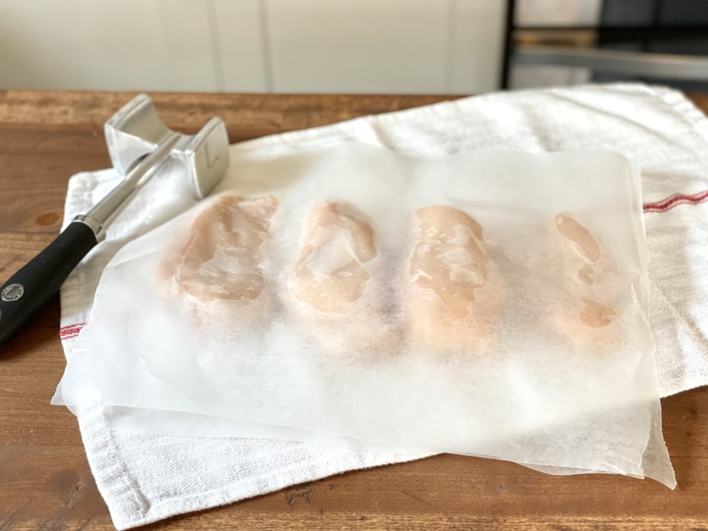 chicken breasts under wax paper for keto chicken-fil-a grilled chicken sandwich