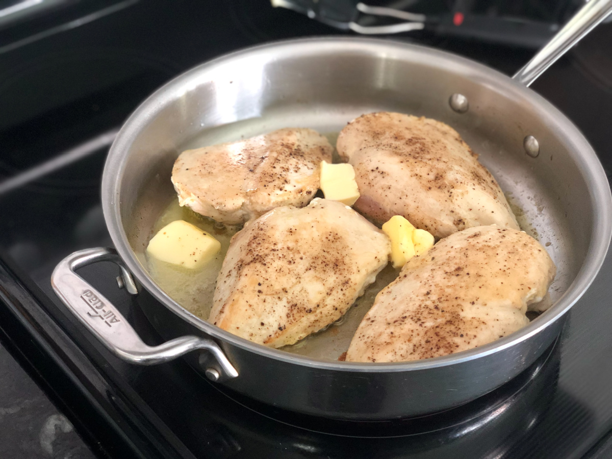 pan grilling chicken breasts in butter