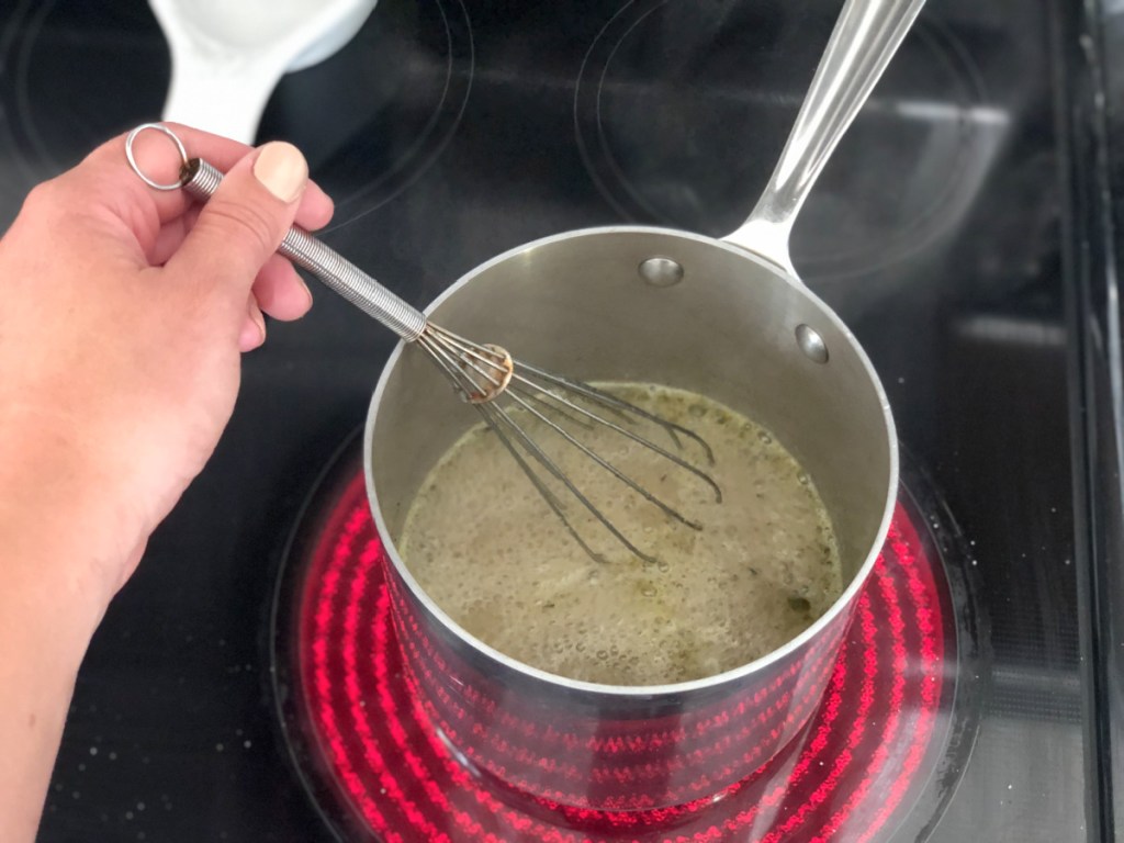 mixing keto gravy in a saucepan