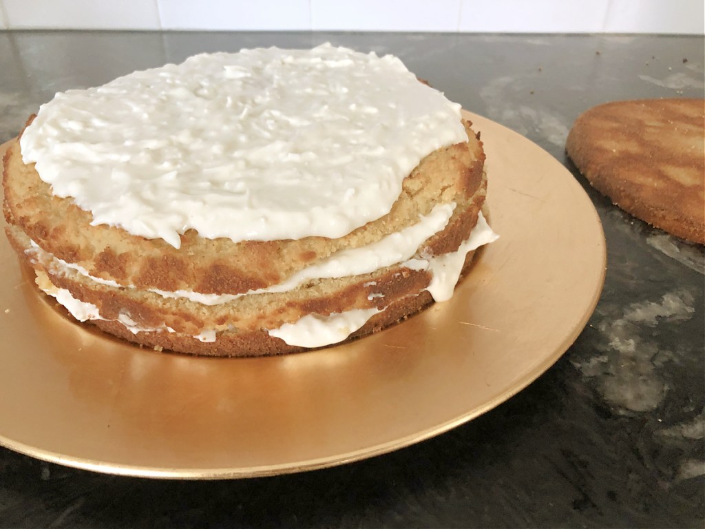 assembling keto coconut cake