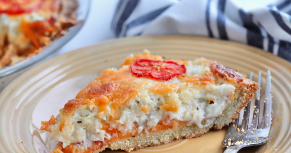 fresh tomato pie slice on a plate