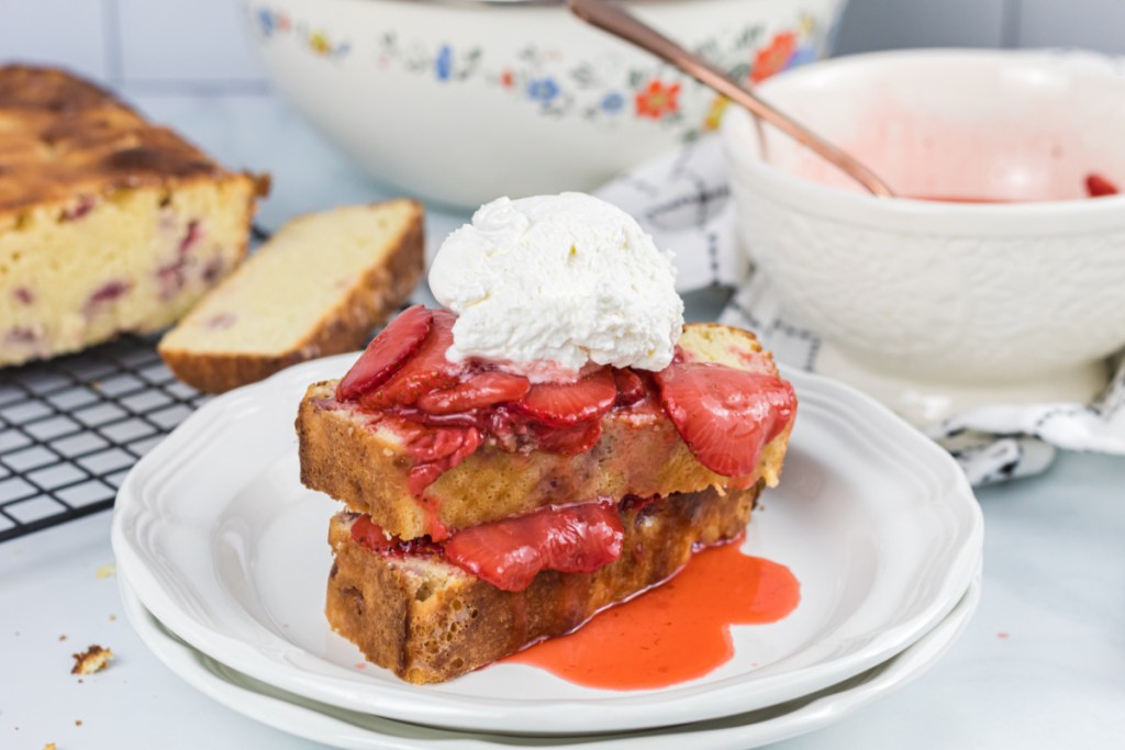 strawberry shortcake stacked on a plate