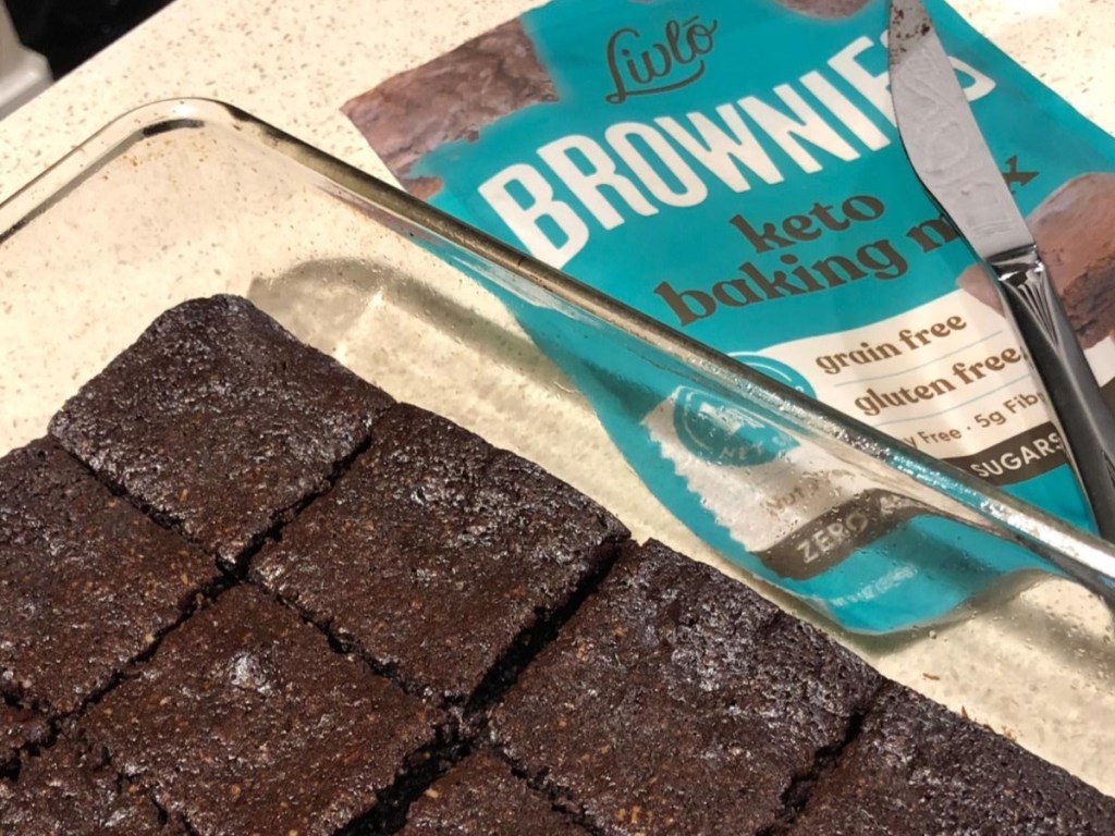 keto brownie mix next to brownies in glass pan