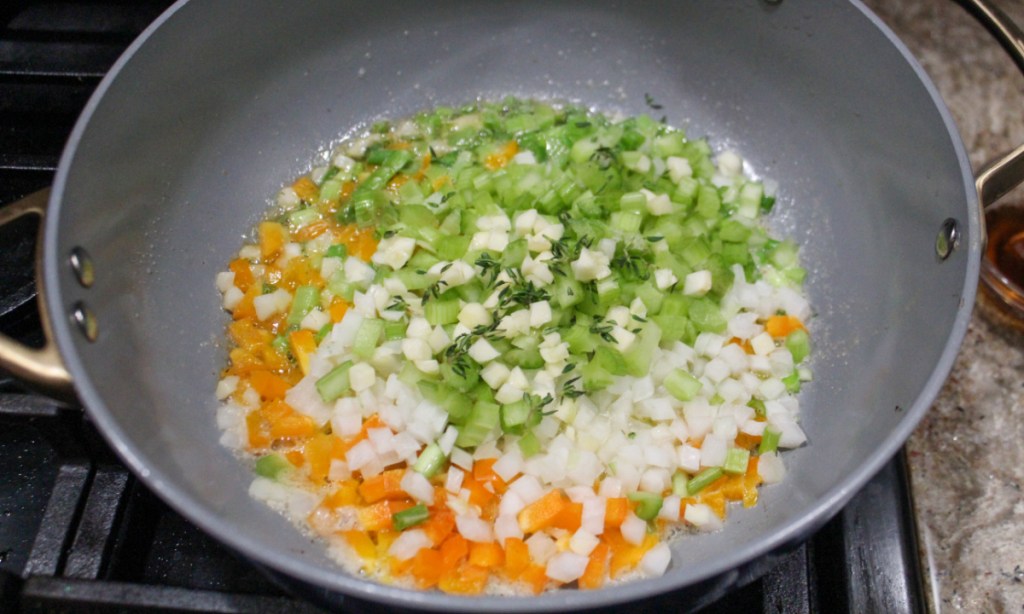 vegetables for creamy cauliflower soup cooking in a pot