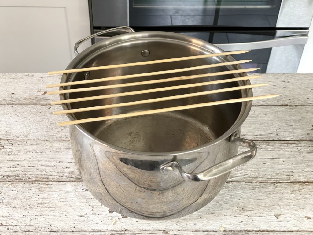 skewers over a stockpot
