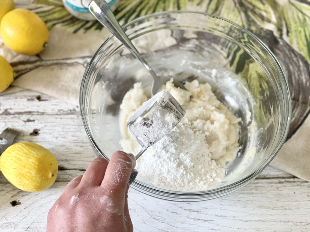 adding keto sweetener to keto lemon fat bombs 