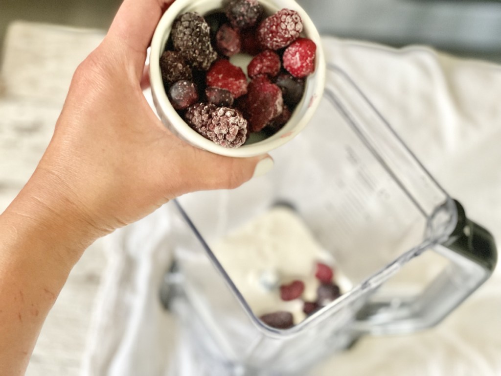 adding berries to Keto Milkshake