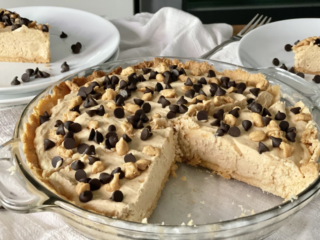 Keto peanut butter pie with a slice out