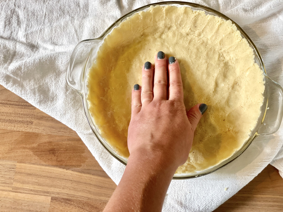 pressing almond flour crust for keto peanut butter pie