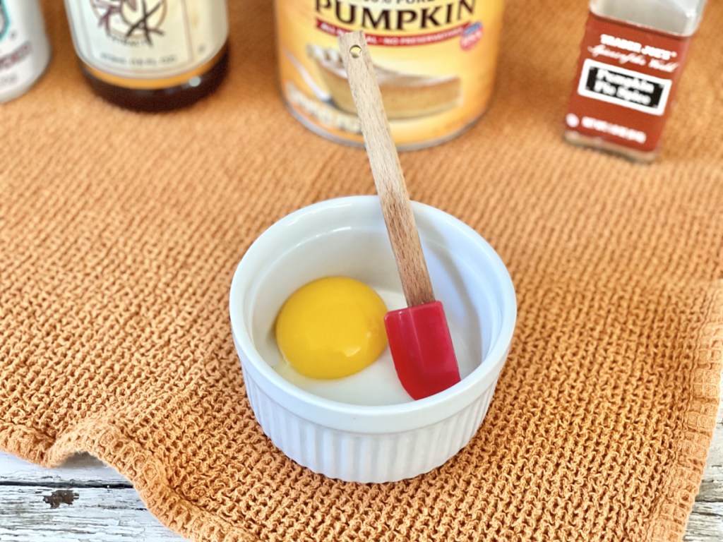  Keto Pumpkin Mug Cake mixing egg yolk