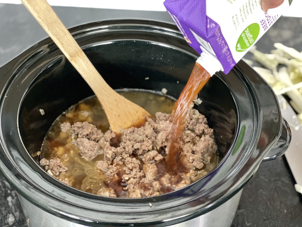 adding beef stock to Low Carb Cabbage Roll Soup