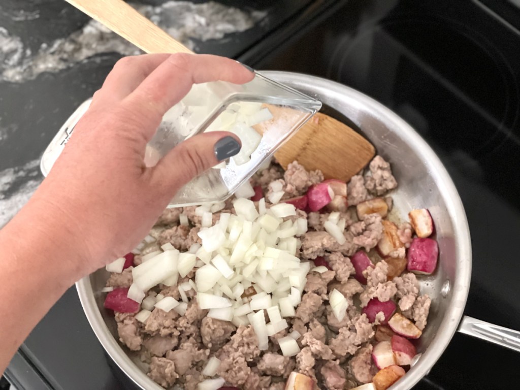 adding onions to eggless sausage hash