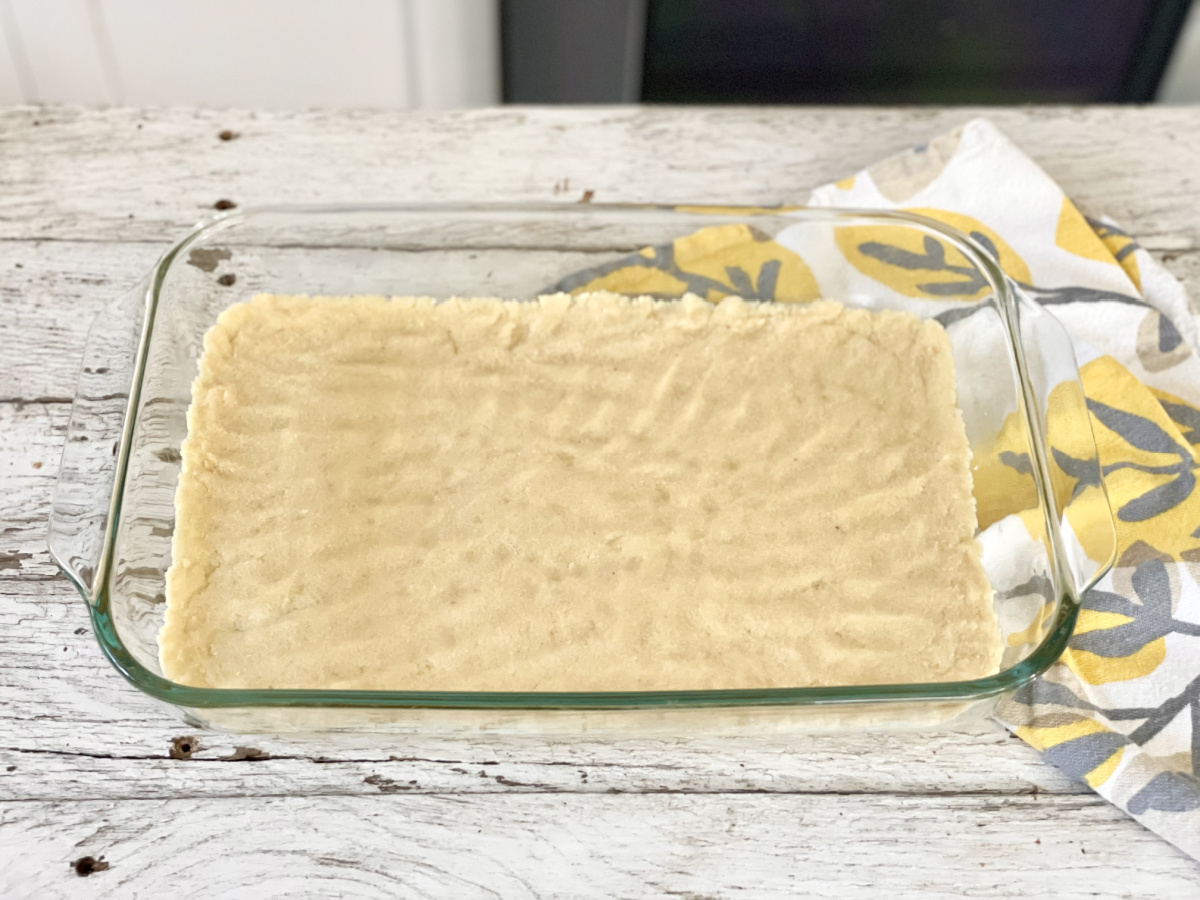 keto shortbread crust in a baking dish