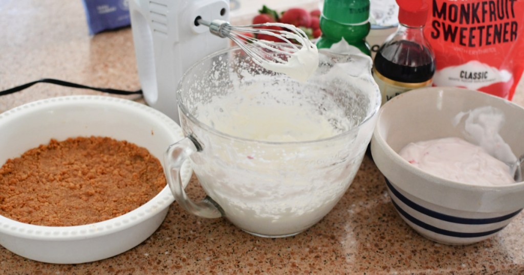 making whipped cream in a mixing bowl