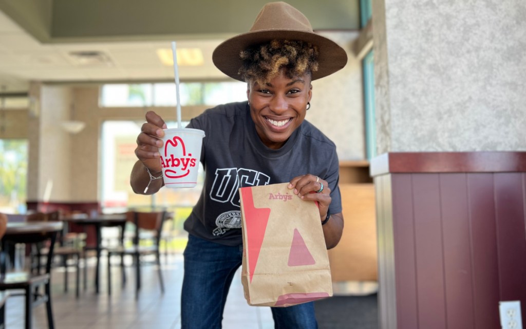 holding up arbys keto order and drink