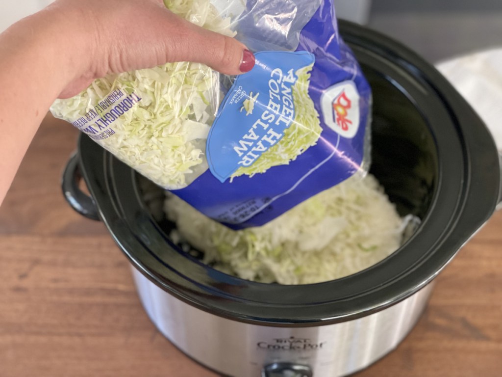 adding shredded cabbage to slow cooker