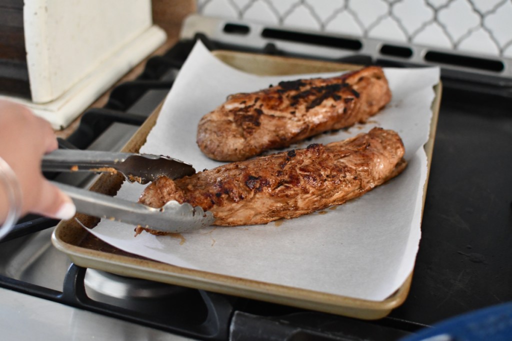 Keto Maple Pork Tenderloins on a baking sheet 