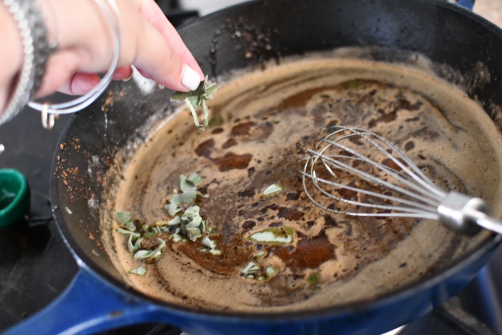 adding fresh sage to glaze for Keto Maple Pork Tenderloins