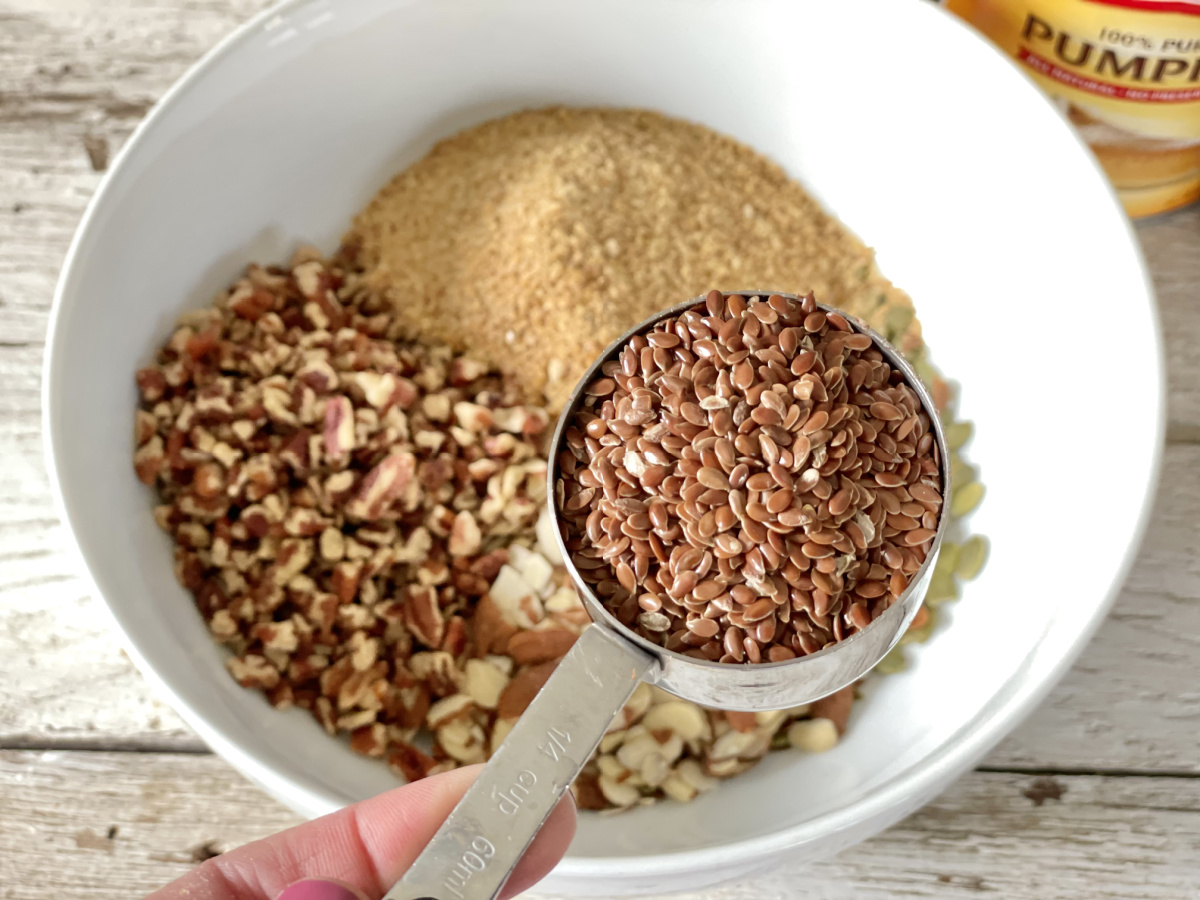 adding flaxseeds to granola bar mix