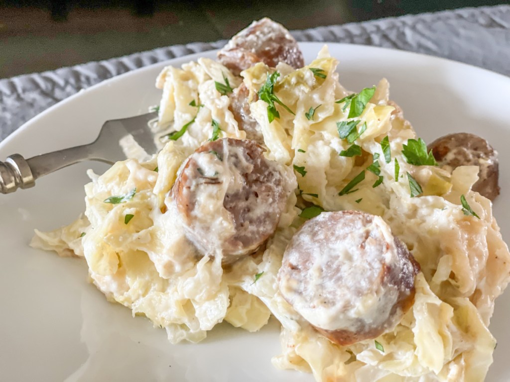 plated Keto Sausage Alfredo with Cabbage
