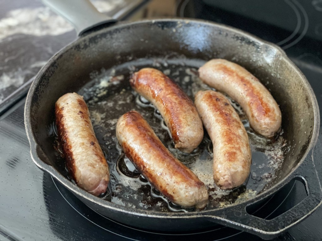 pan cooking sausage for Keto Sausage Alfredo with Cabbage