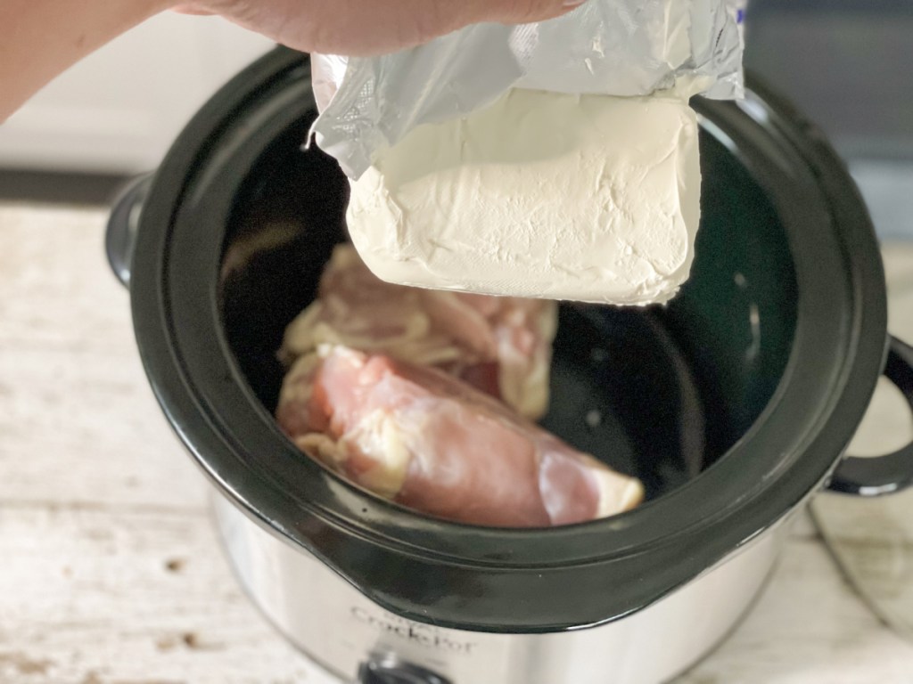 adding cream cheese to crockpot for keto slow cooker cream cheese chicken