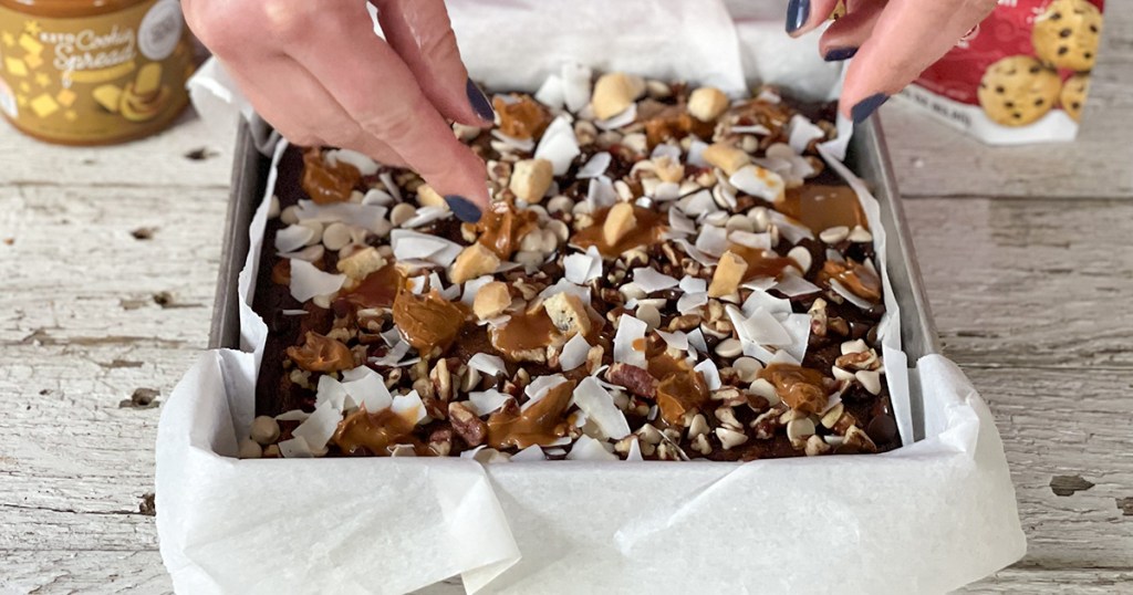 adding toppings for choczero kitchen sink brownies